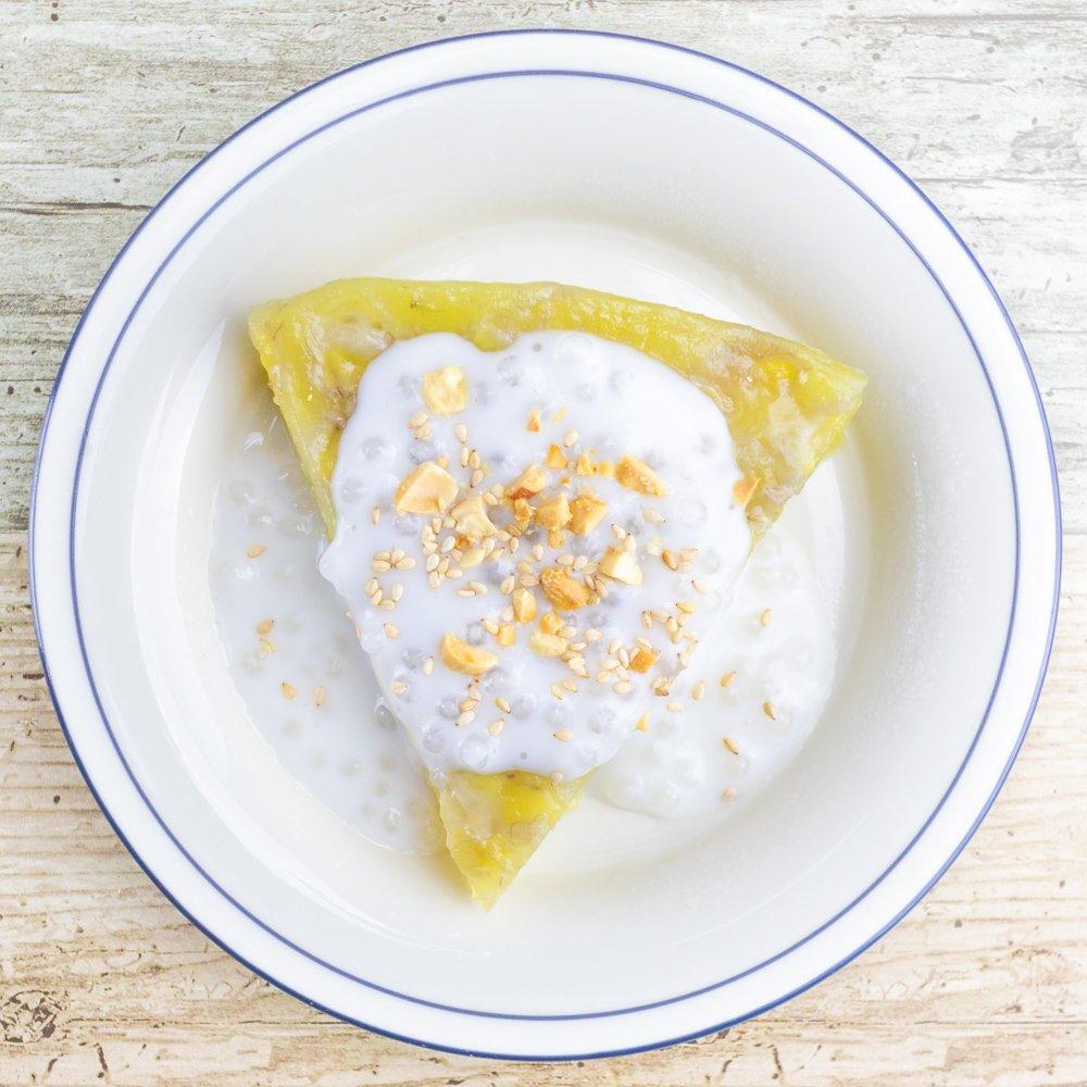 Vietnamese Steamed Banana Cake (Banh Chuoi Hap) with coconut milk sauce